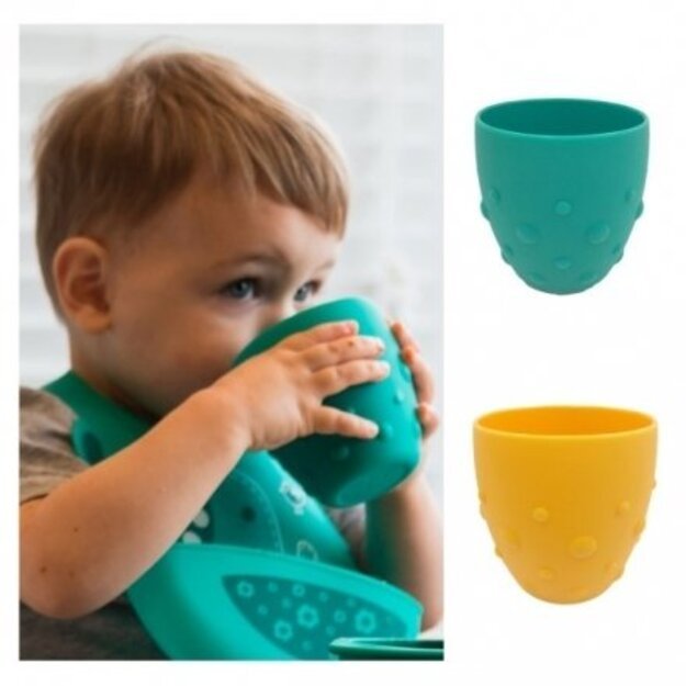 Rausvas silikoninis puodelis „Kad rankutės įprastų nepilstyti“